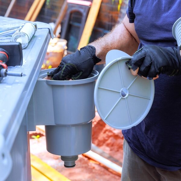 Debris being removed from pool filter